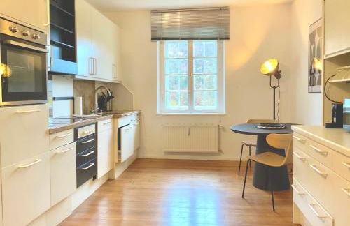 Edle Altbauwohnung trifft oberbayrisches Bergidyll - Foto 3