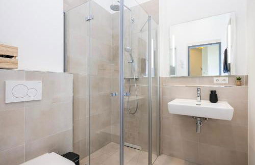 mayhome - das STRANDLOFT schönes Studioapartment mit Balkon, Küche und Tiefgarage - Sauna und Fitness direkt nebenan - Foto 17