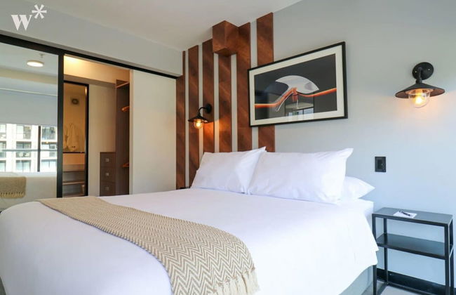 w Sleek 1BR in San Isidro - Photo 1