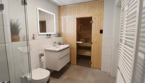 KÜSTE33/24 – Exklusive Ferienwohnung mit Sauna & nah am Strand! - Foto 2