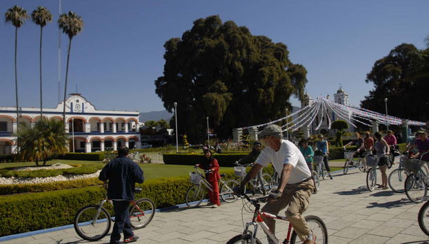 Pedaling past the Municipal Palace