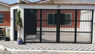 Casa aconchegante a poucos passos da Praia 8 Pessoas Churrasqueira-garagem - Foto 2