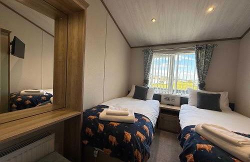 Highland Holiday Getaways - The Heilan' Lodge - Foto 19