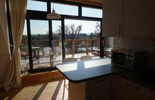 FeWo OG am Fluss mit Balkon - ein himmlischer Ausblick - Foto 2