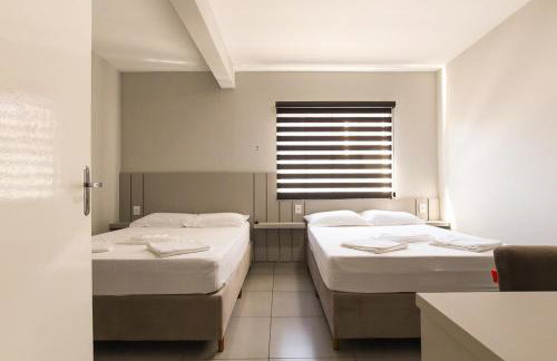 Lou Suítes - Suíte 03 com 2 camas de casal - Conforto para sua Família - Foto 37