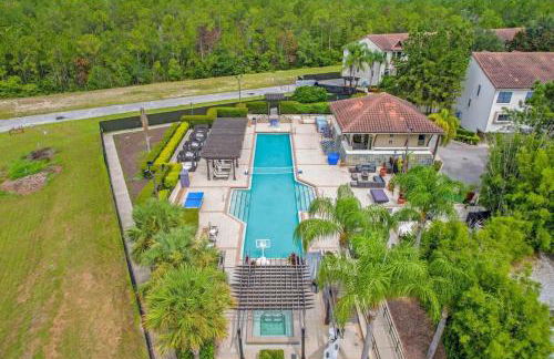 Cozy & Elegant 4BR Enchanted Townhouse - 1 Mile to Disney with Resort Pool, Gym, & Jacuzzi - Photo 73