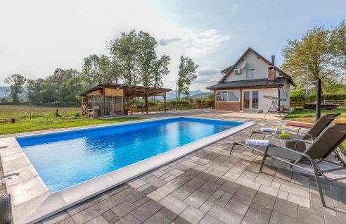 Beautiful Home In Smiljan With Sauna - Photo 1