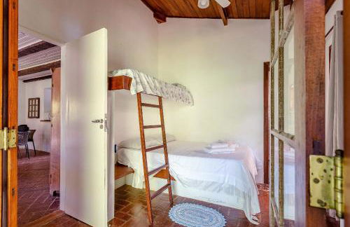 Casa dos Pássaros na areia a 20m da Praia da Baleia com 3 suítes e 1 dorm com ar condicionado, wifi, smart tv, cozinha completa e churrasqueira - Foto 7