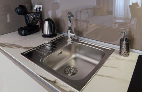 L-Suites - Photo 17