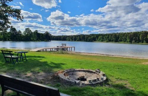 Domki przy jeziorze z prywatną plażą w Borach Tucholskich Pensjonat Alicja wczasy z dziećmi nowe luksusowe domki na skraju jeziora i lasu - Foto 19