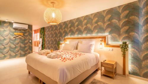 Suite Emeraude Spa Détente avec Balnéo Double & Sauna - Foto 1