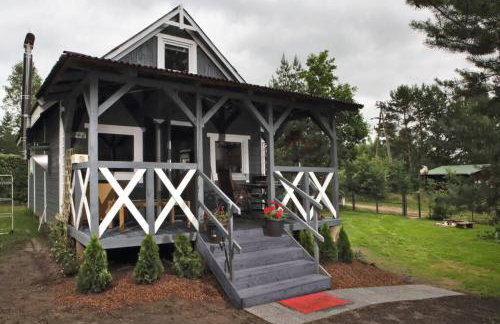 Drewniany domek nad jeziorem w Sitnie - Foto 14