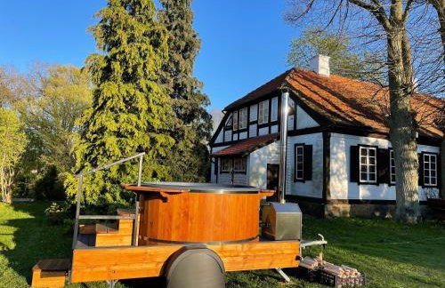 Apartament w XIX-wiecznym Spichlerzu nad Jeziorem z dostępem do parku i widokiem na Dworek Modrzewiowy z 1823 roku - Foto 30