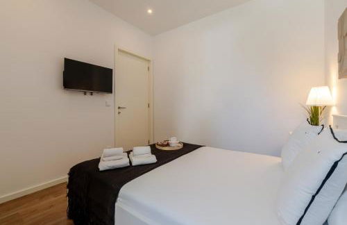 Sleek & Modern Flat w/ Private Garage by HostWise - Photo 14