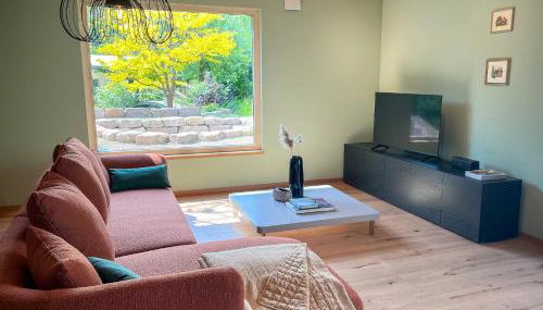 Amber Ferienhain - Ferienhaus 'Magnolie' mit verwunschenem Garten & privater Sauna - Foto 3, Garden view