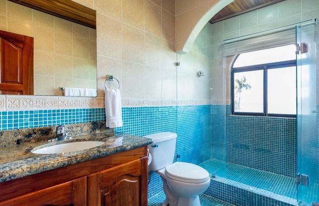 Beachfront Condo with Warm, Rustic Interiors & Direct Access to Playa Flamingo - Photo 15