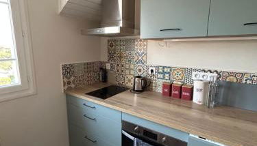 Appartement les pieds dans l'eau à Hauteville sur mer - Foto 3, stove