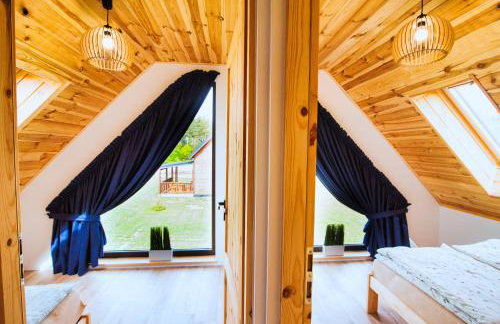 Rumiane Chatki - Domki z Jacuzzi i Basenem - Foto 13