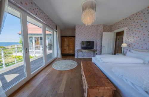 Ferienhaus Peeneblick - exklusives Traumhaus in Direktlage am Wasser mit Bootssteg und Aussensauna - Foto 13