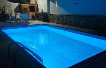 Belíssima Casa a Beira Mar com Piscina Aquecida Cobrado a Parte, 5 Quartos com Ar Condicionado, Amplo Salão de Jogos com Mesas de Bilhar e Pebolim, Amplo Espaço Externo com Churrasqueira em Deck Gourmet Coberto frente a Piscina,Tudo isso á Beira Mar - Photo 4