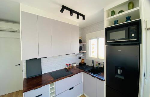 Duplex with private Rooftop and views - Photo 10