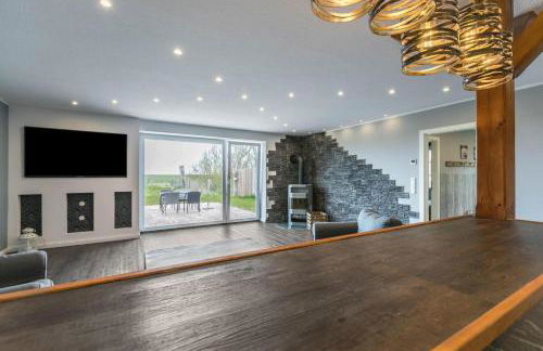 Modernes Holzhaus mit traumhaftem Deichblick - Foto 9