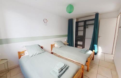 Le 34 degrés sud - 2 chambres - jardinet et jacuzzi - Foto 6