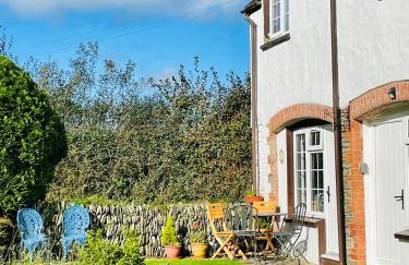 Honeysuckle Cottage - Foto 1