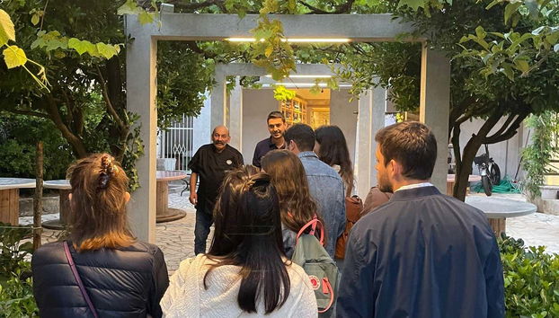 Listen to a guide during this winery tour