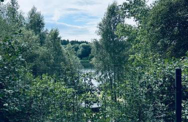 Domek nad jeziorem Wilczyńskim dla czterech osób, sypialnia z łożem małżeńskim oraz salon z rozkładanym narożnikiem - Photo 24