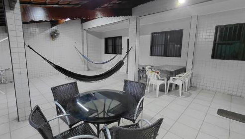 Casa com piscina, ar condicionado, churrasqueira, estacionamento, pet friendly - Foto 3