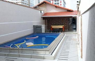 "Lindíssima Casa Pé na Areia com Opção da Piscina Aquecida Cobrado a Parte, Sala de Jantar, 3 Amplos Quartos, Sendo1Suíte, Amplo Espaço de Lazer com Área Gourmet em Deck Coberto com Churrasqueira e Mesa de Bilhar Frente a Piscina, Super Pertinho da Praia" - Photo 11