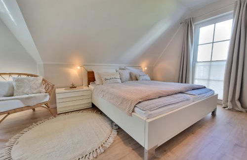 Düne 4 - Ferienunterkunft mit eigenem Garten in der beliebten Dünenresidenz - sanftes Meeresrauschen inklusive - Foto 15