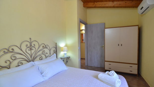 IzzHome Nora Beach - Photo 4, Chambre