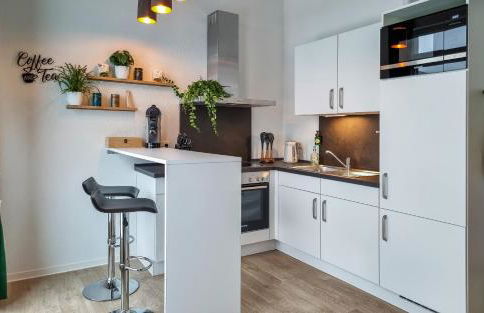 WiLUKA Penthouse mit großer Dachterasse -highspeed Wifi- 24Std Check-In -nachhaltig eingerichtet- Netflix - Photo 2