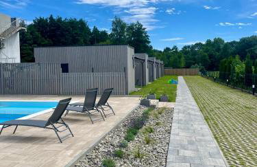 A Morze Domki- Podgrzewany basen, całoroczne klimatyzowane domki, parking - Foto 3