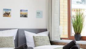 mayhome - das STRANDLOFT schönes Studioapartment mit Balkon, Küche und Tiefgarage - Sauna und Fitness direkt nebenan - Foto 2