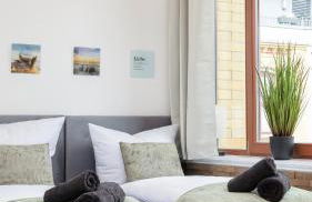 mayhome - das STRANDLOFT schönes Studioapartment mit Balkon, Küche und Tiefgarage - Sauna und Fitness direkt nebenan - Foto 2