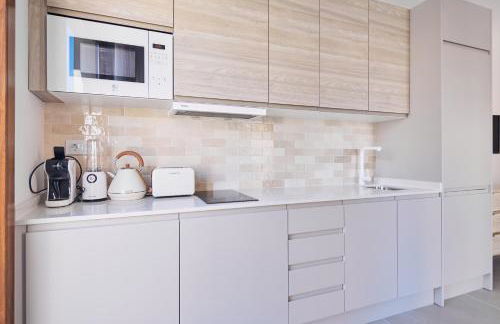 Slow Home Apartments - Photo 28