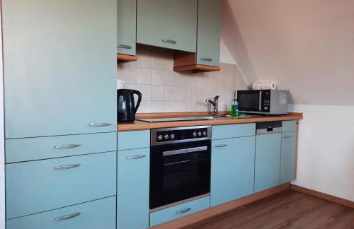 Ferienhaus Sasse Ferienwohnungen mit Garten & Grill - Foto 17