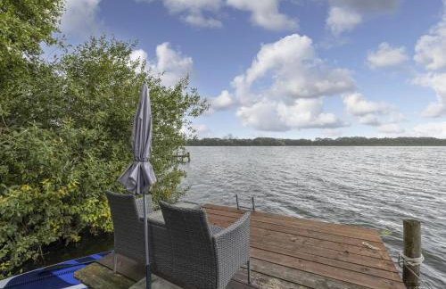 Nelsen mit Ruderboot auf Wassergrundstück - Photo 26