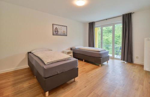 Monteurwohnungen in Trier - Parkplatz - Einzelbetten - Waschmaschine und Trockner - Foto 6