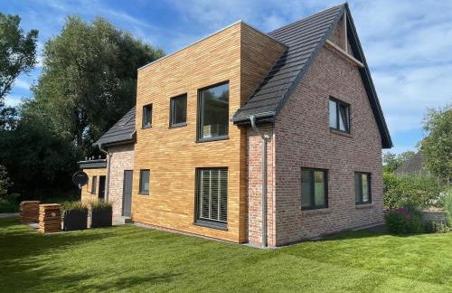 Deichkoje12 Deck 1 EG direkt am Eiderdeich nur 7 km bis zur Nordsee und 20 Min bis Sankt Peter Ording - Foto 3