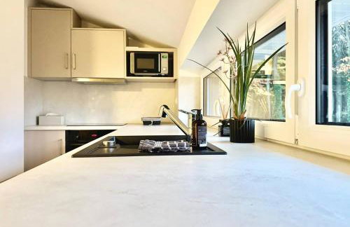 Modernes Ferienhaus am See mit Garten - Photo 29