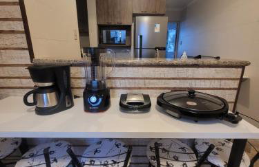 Apartamento Aconchego Frente Mar - Vila Guilhermina Praia Grande SP - Cozinha Completa - Climatizador de Ar - TV a Cabo - Wi-Fi - Photo 15