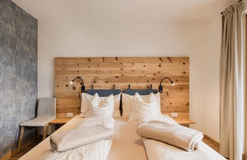 Felsenegg appartements - moderne Wohnungen im Luftkurort mit traumhaftem Garten Nähe Meran für Paare und Familien - Foto 24