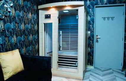 Loveroom 50 nuances de bulles jacuzzi et sauna privatif - Foto 4