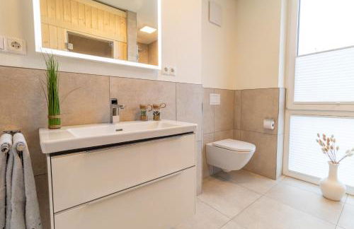 BeltBlick 18 – Ostseeleuchten - Moderne Ferienwohnung mit Dachterrasse direkt an der Ostsee! - Foto 24