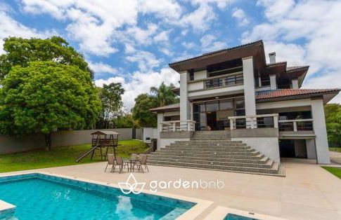 Refúgio de Luxo e Piscina à beira do Passaúna - Photo 1