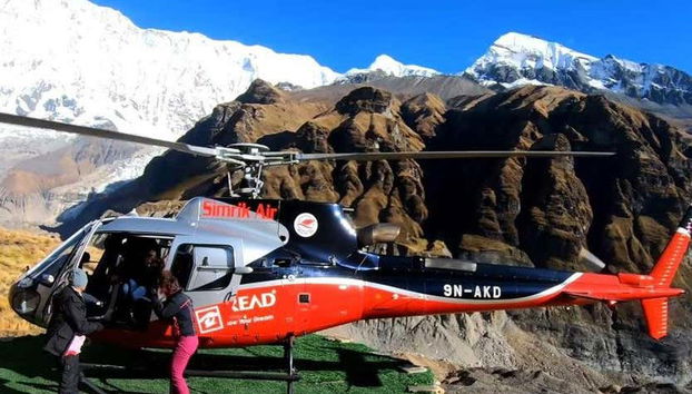 Helicopter landing at base camp